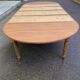 Round extendable banquet table stripped in solid mahogany with 4 extensions, 19th century.