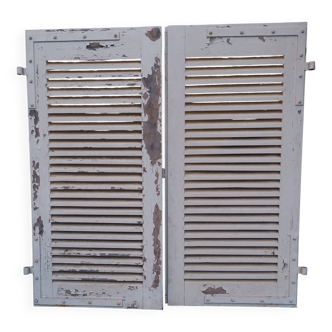 Pair of tropical wood shutters