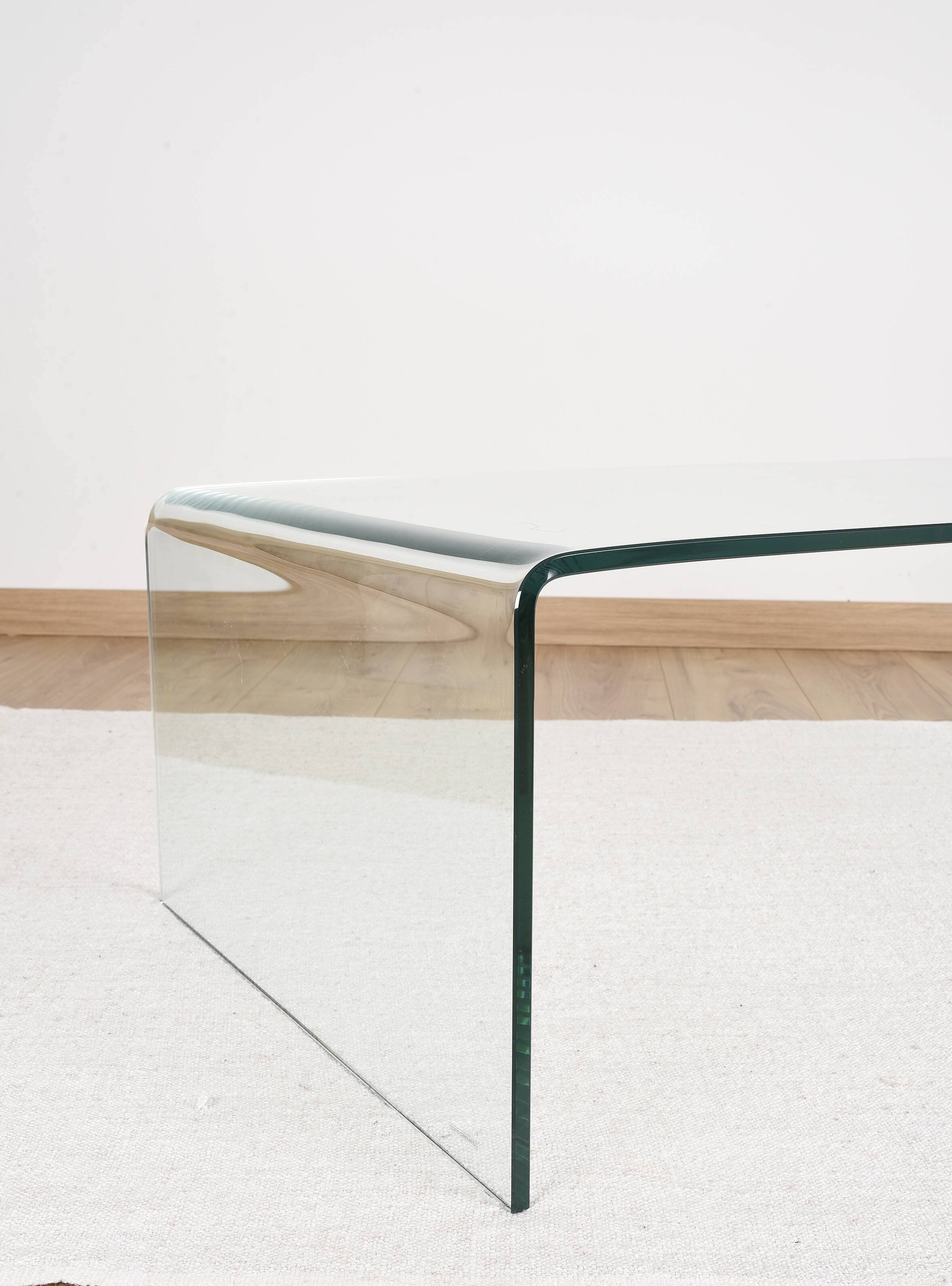 Transparent tempered glass coffee table.