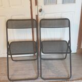 Pair of folding chairs in perforated metal