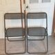Pair of folding chairs in perforated metal