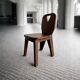 retro brutalism chair in dark solid wood
