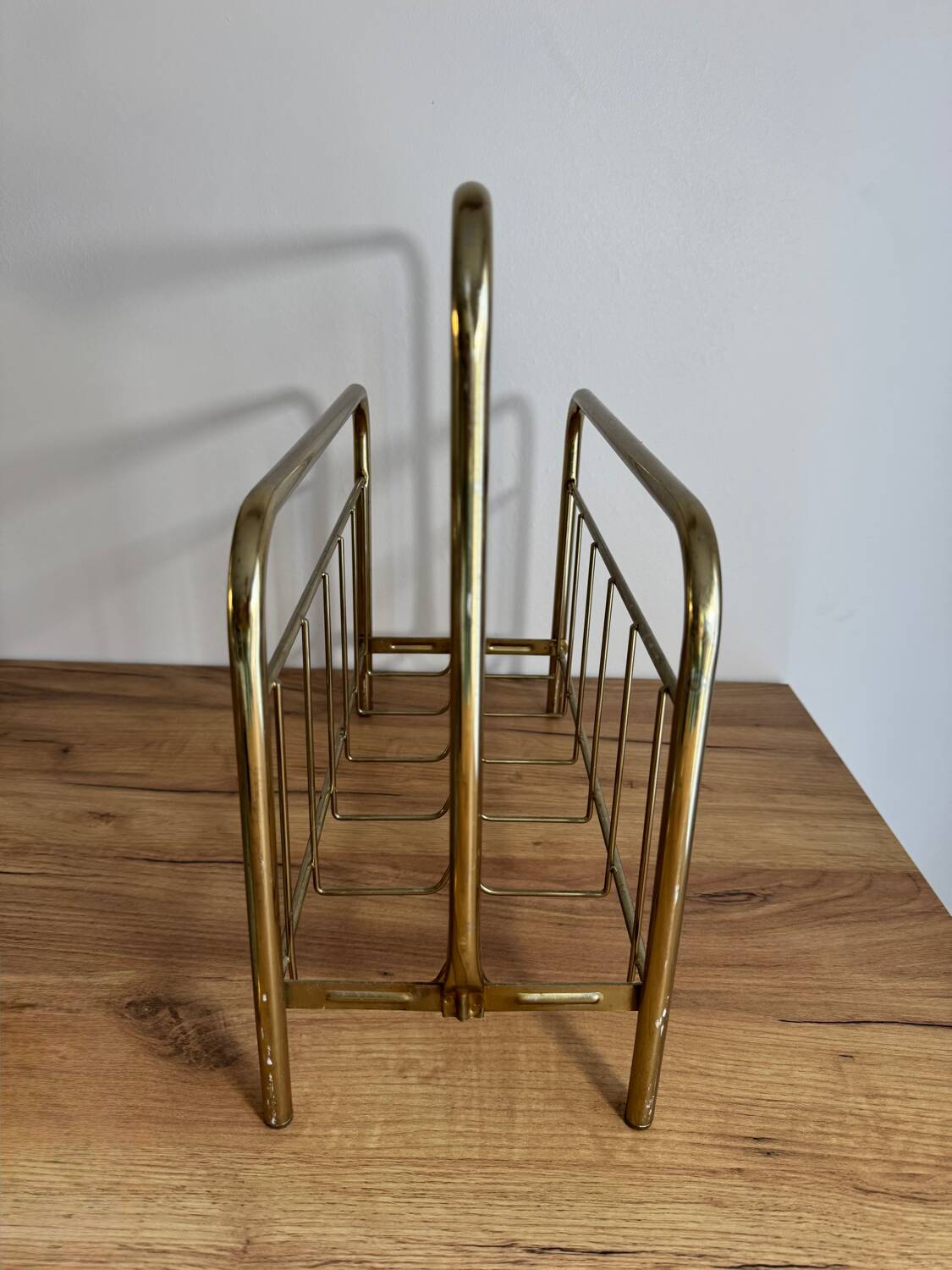 Vintage gold magazine rack