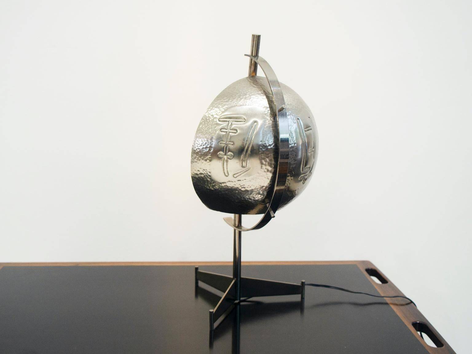 Metal table lamp with triangular glass light on tripod stand, 1970s.