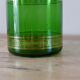 Green vintage apothecary pot and golden ledé