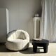 Large white circular armchair, white fabric upholstery