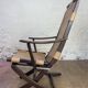 Colonial style leather armchair and ottoman