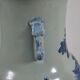 China. Porcelain mallet vase with blue and white phoenix decoration on a rock.