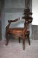 Barber chair in wood and leather with adjustable headrest, office chair.