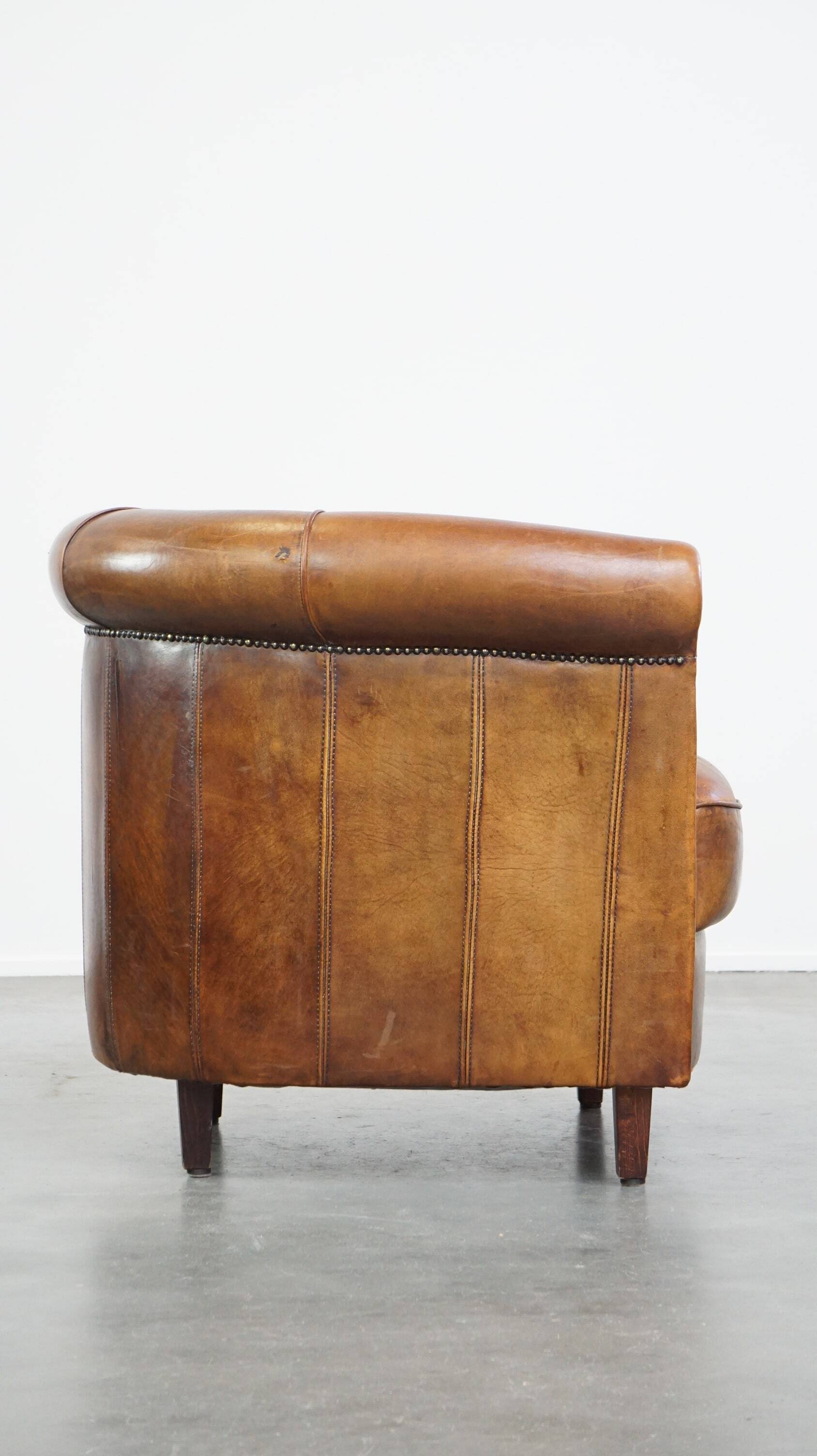Brown leather club chair