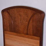 Wooden bed, early 20th century.