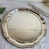 Round silver-plated serving dish with a glass base.