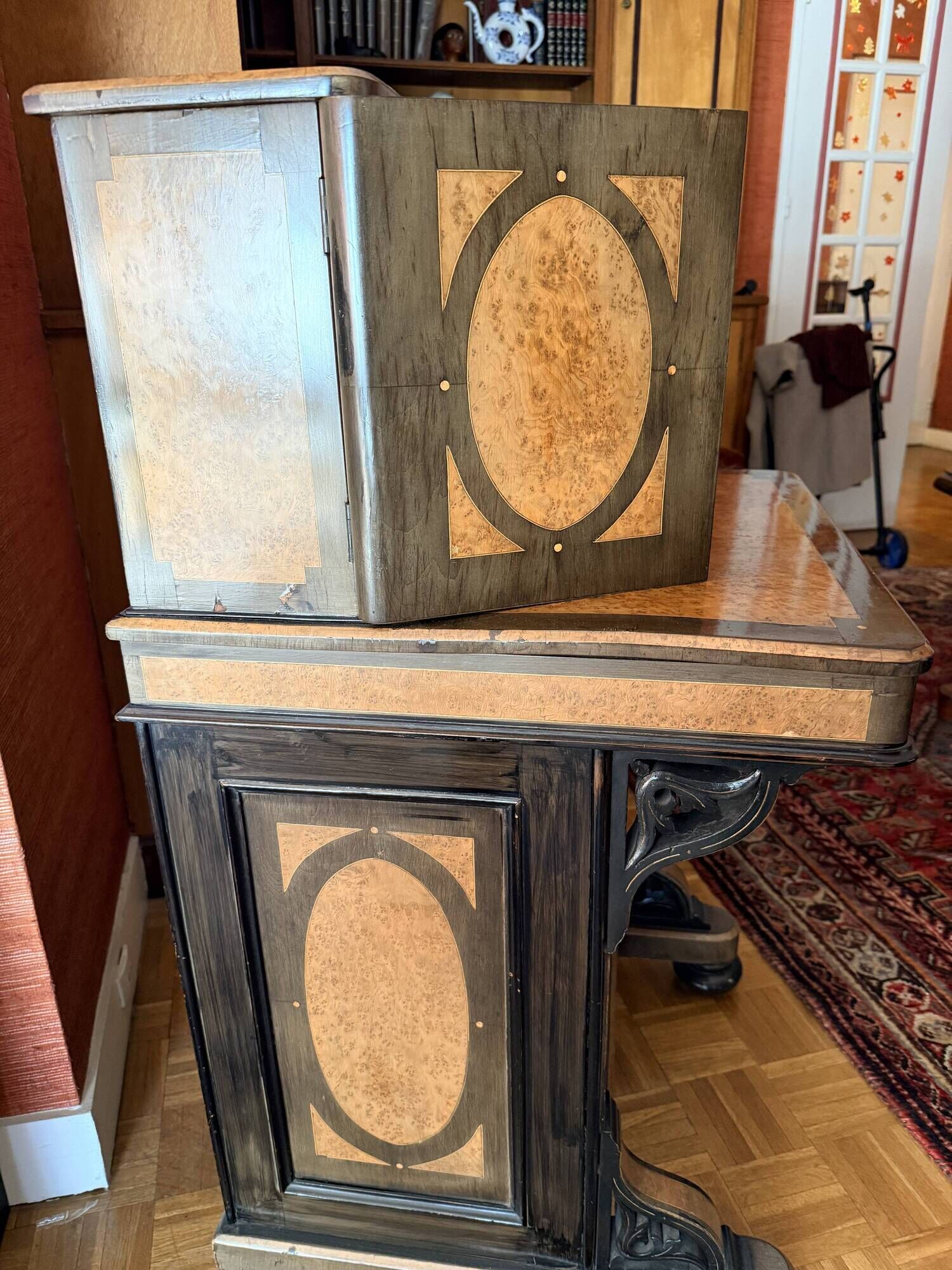 Victorian-era blackened wood and burr walnut Davenport.