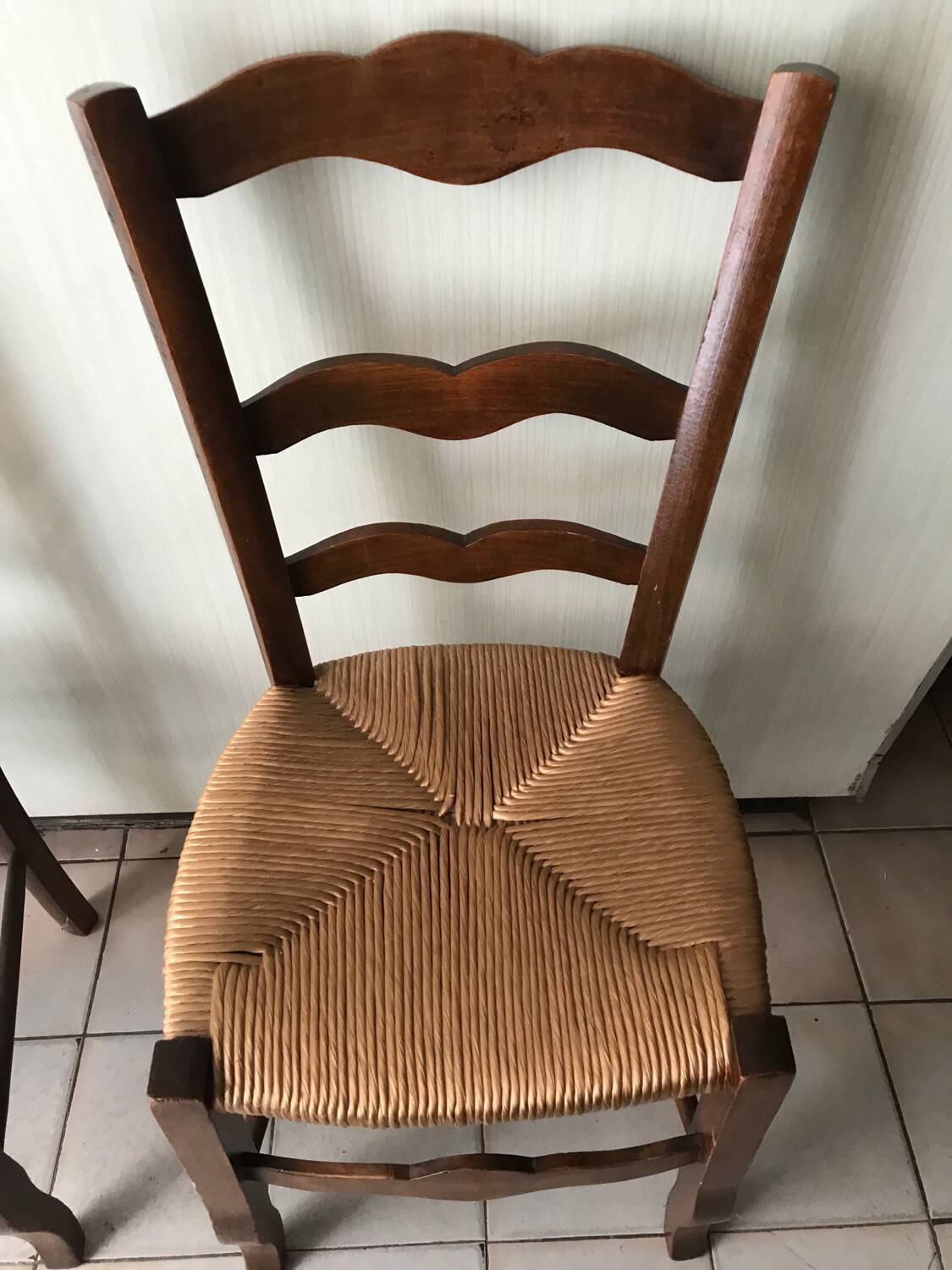 Wooden and straw chairs