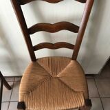 Wooden and straw chairs