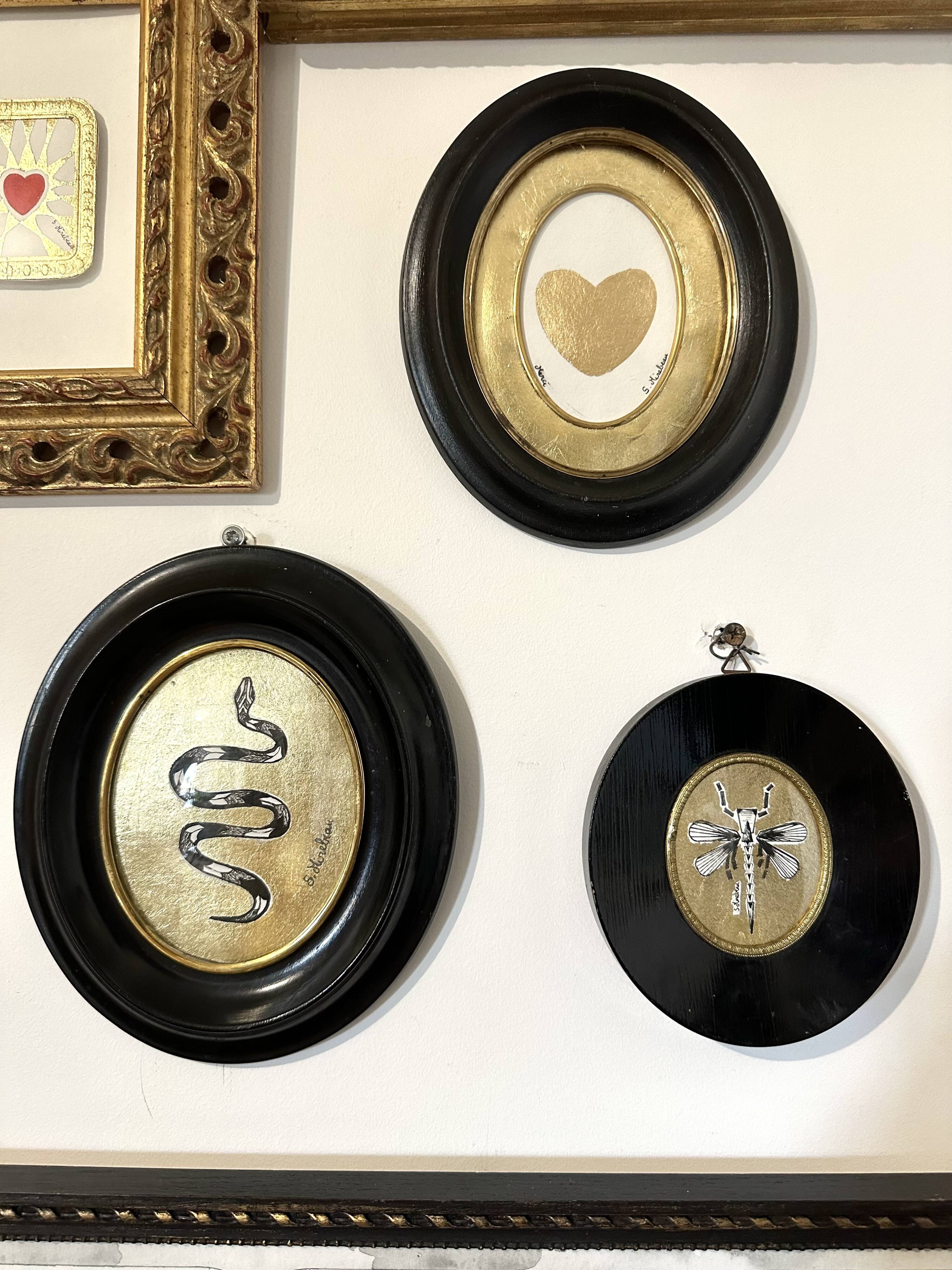 Curved glass snake frame