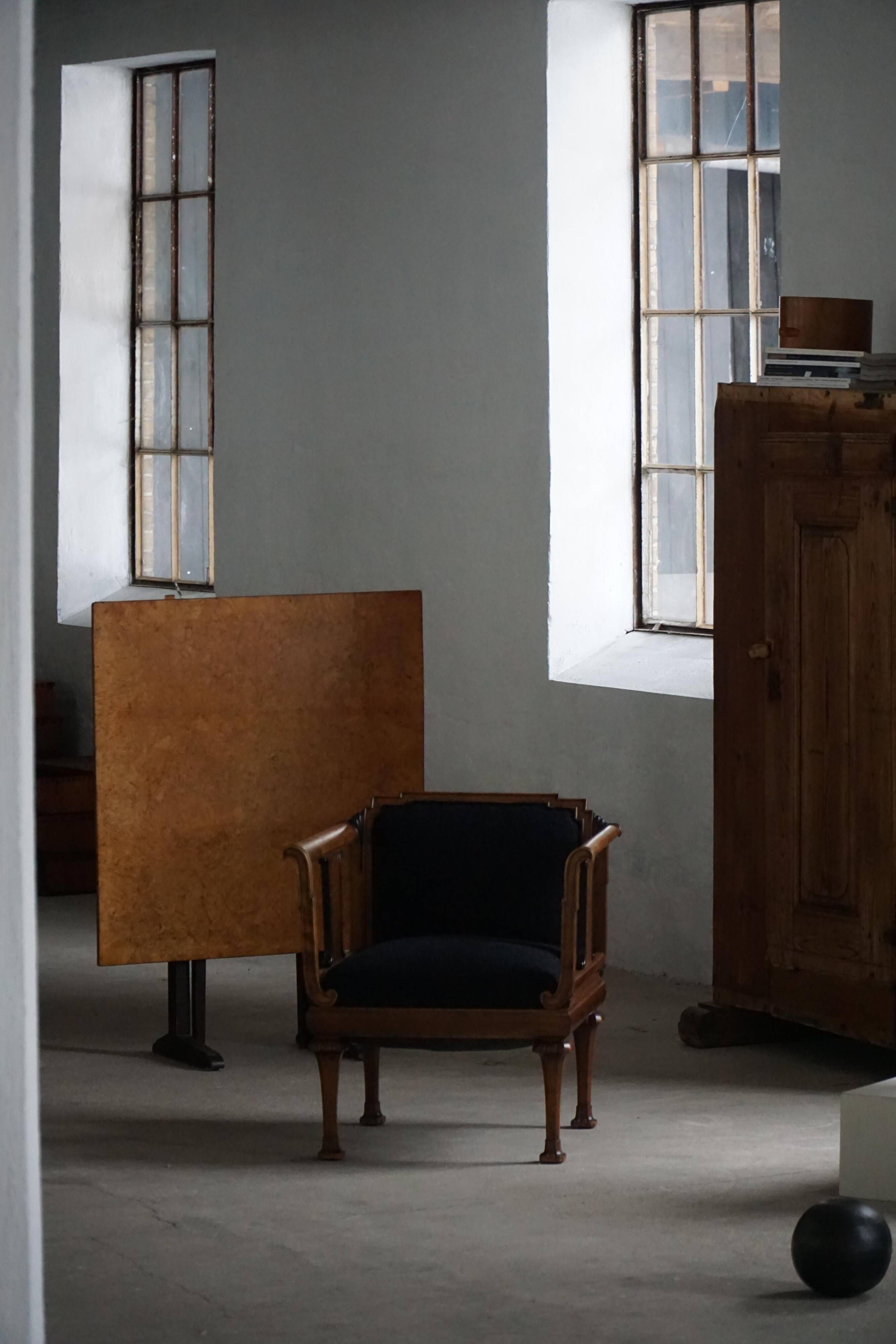 Early 20th century Danish Art Nouveau armchair, reupholstered in charcoal boucle.