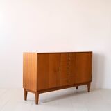 Scandinavian high sideboard with central drawers