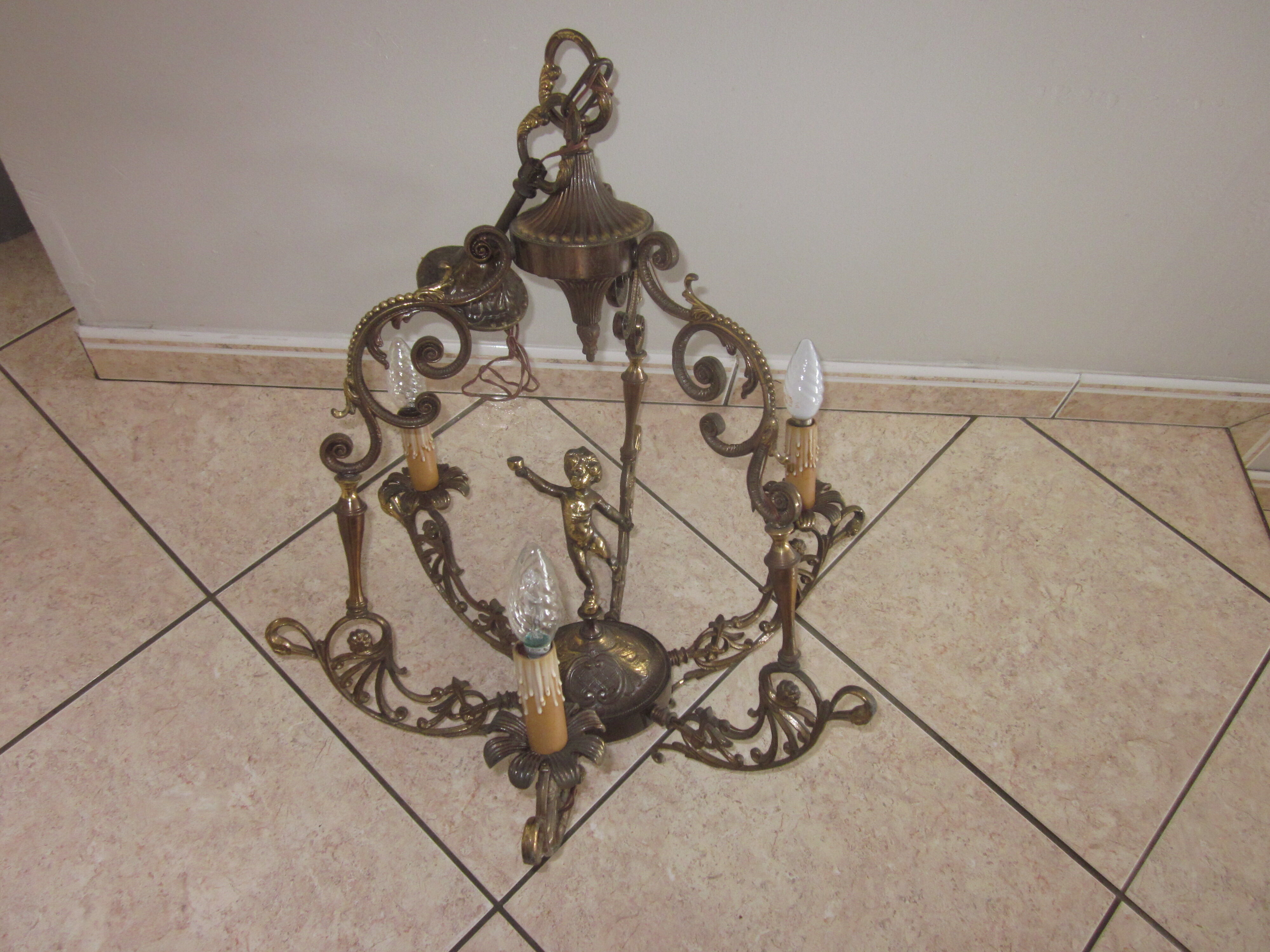 Bronze chandelier with angels