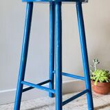 Vintage wooden stool with electric blue paint
