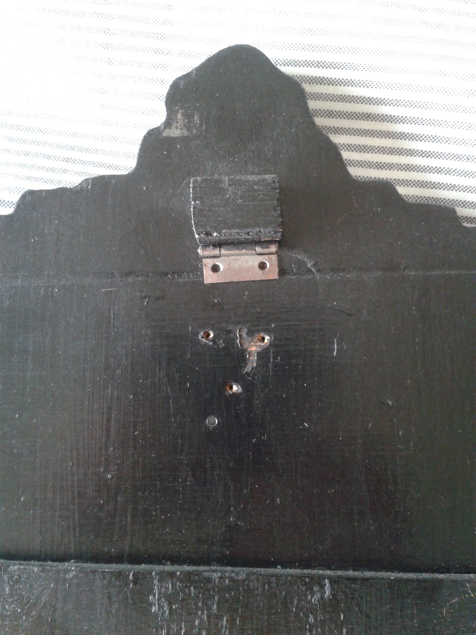 Mirror with embossed metal décor