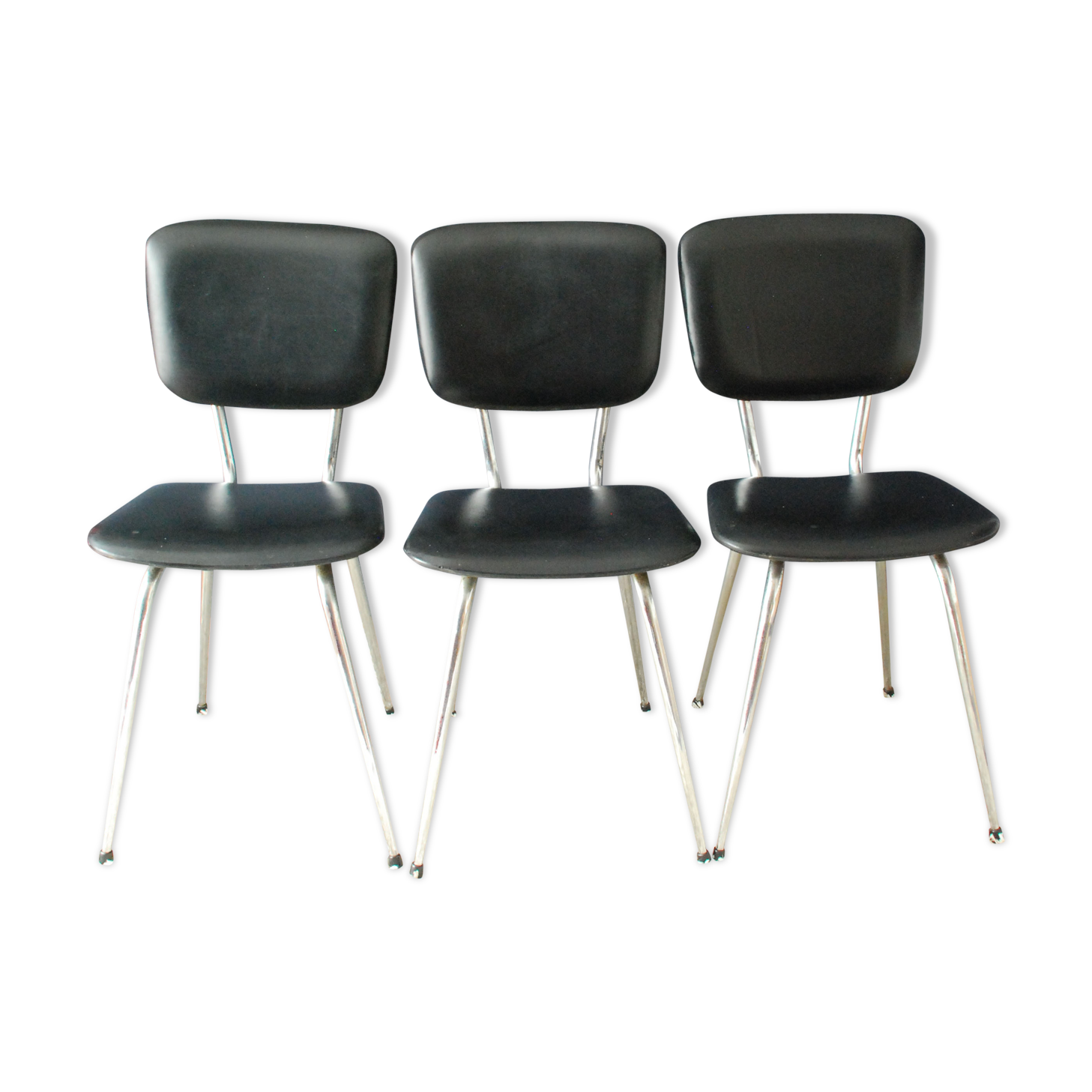 Set of three chairs in black leatherette