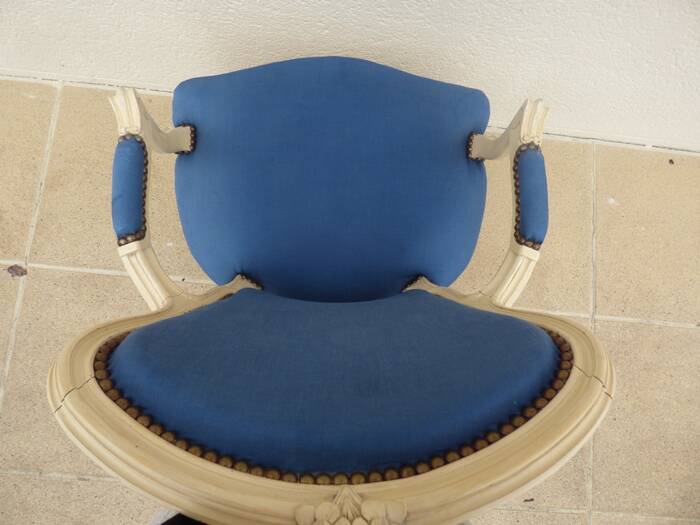 Cabriolet armchair in lacquered wood trimmed in blue satin, Louis XV style