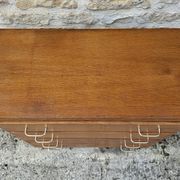 Compass leg chest of drawers