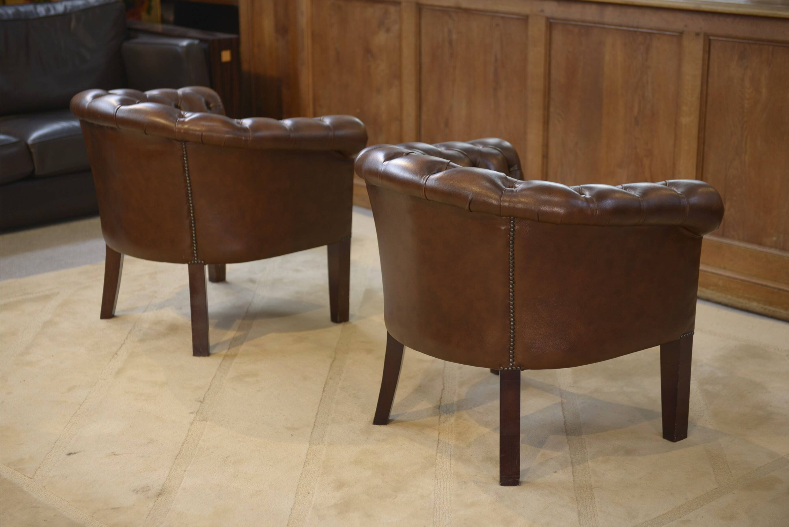 Pair of upholstered leather Club armchairs