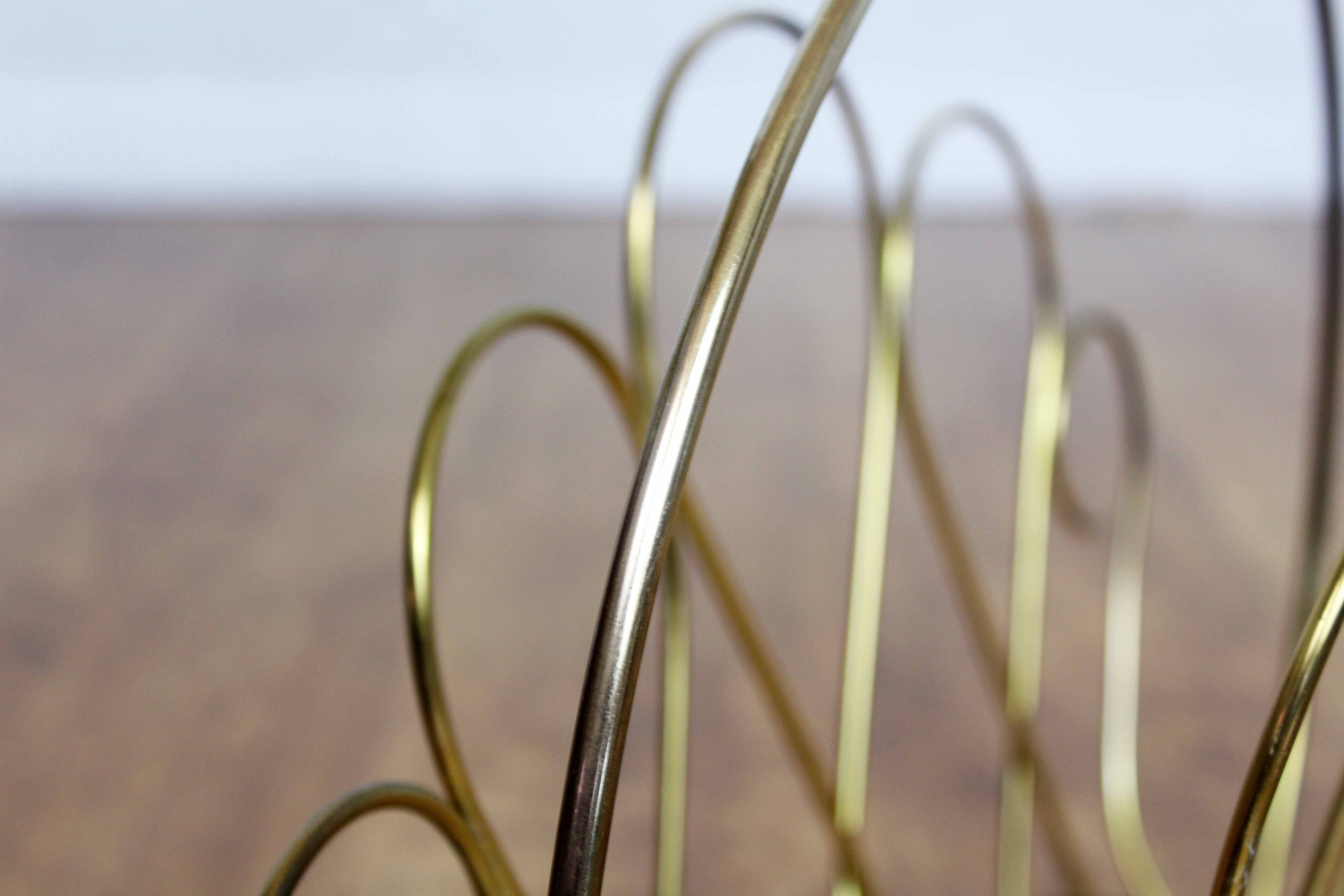 Magazine rack in brass 60