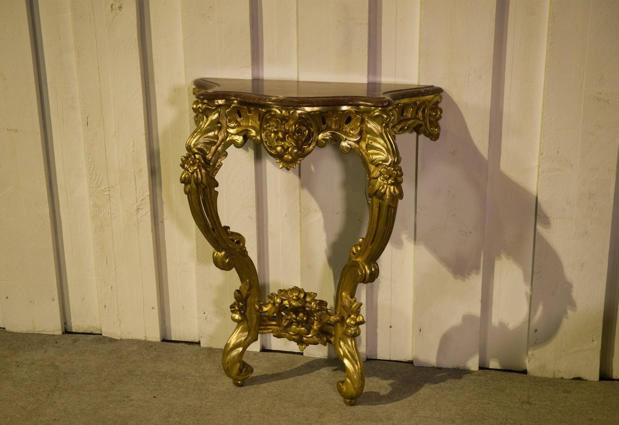 Golden wood and marble console, 19th century.