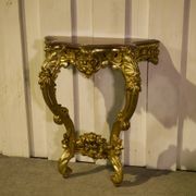 Golden wood and marble console, 19th century.