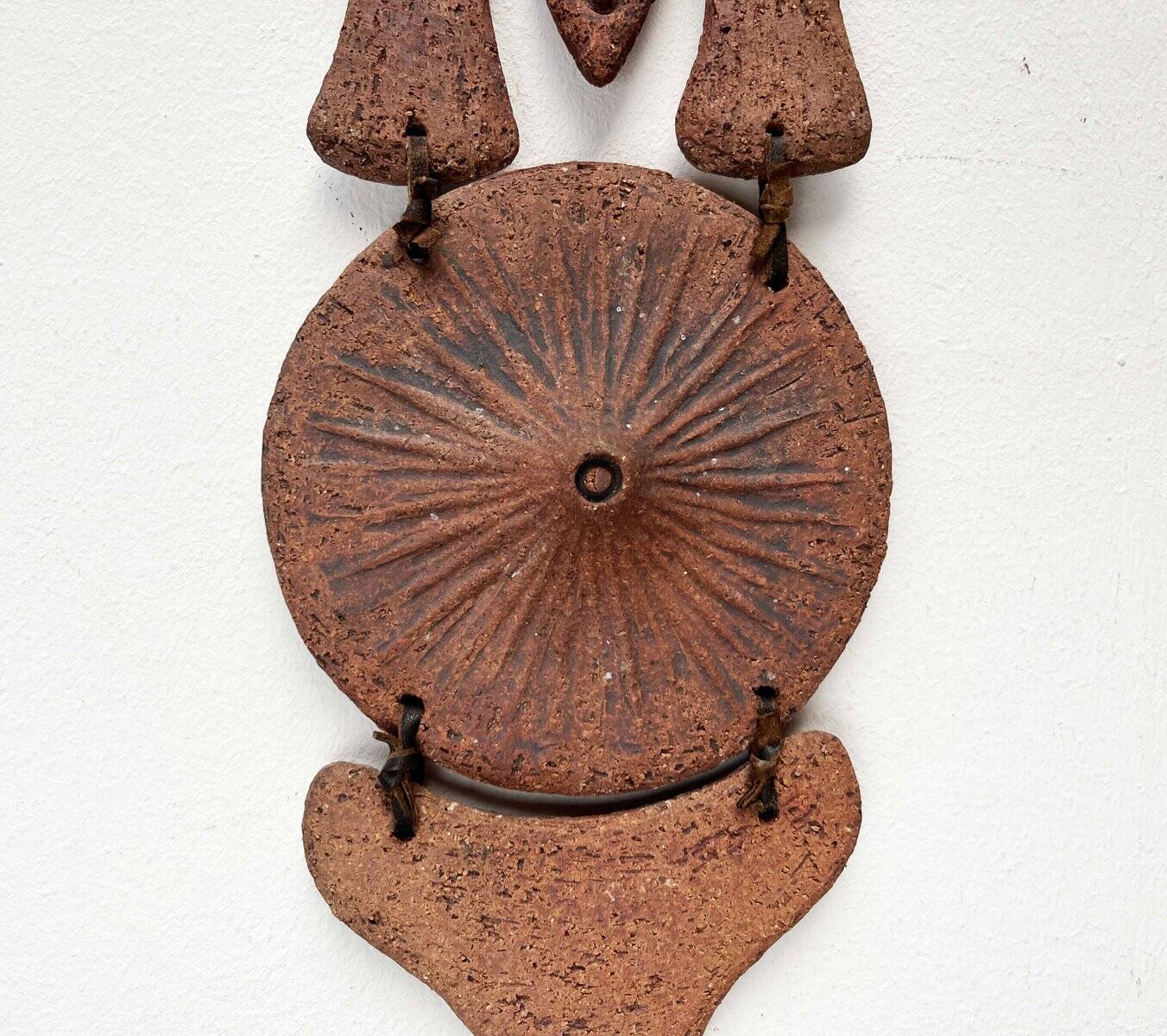 Wall suspension of Danish studio pottery in mid-century brutalist modernist style by Clara Helmich, 1979.