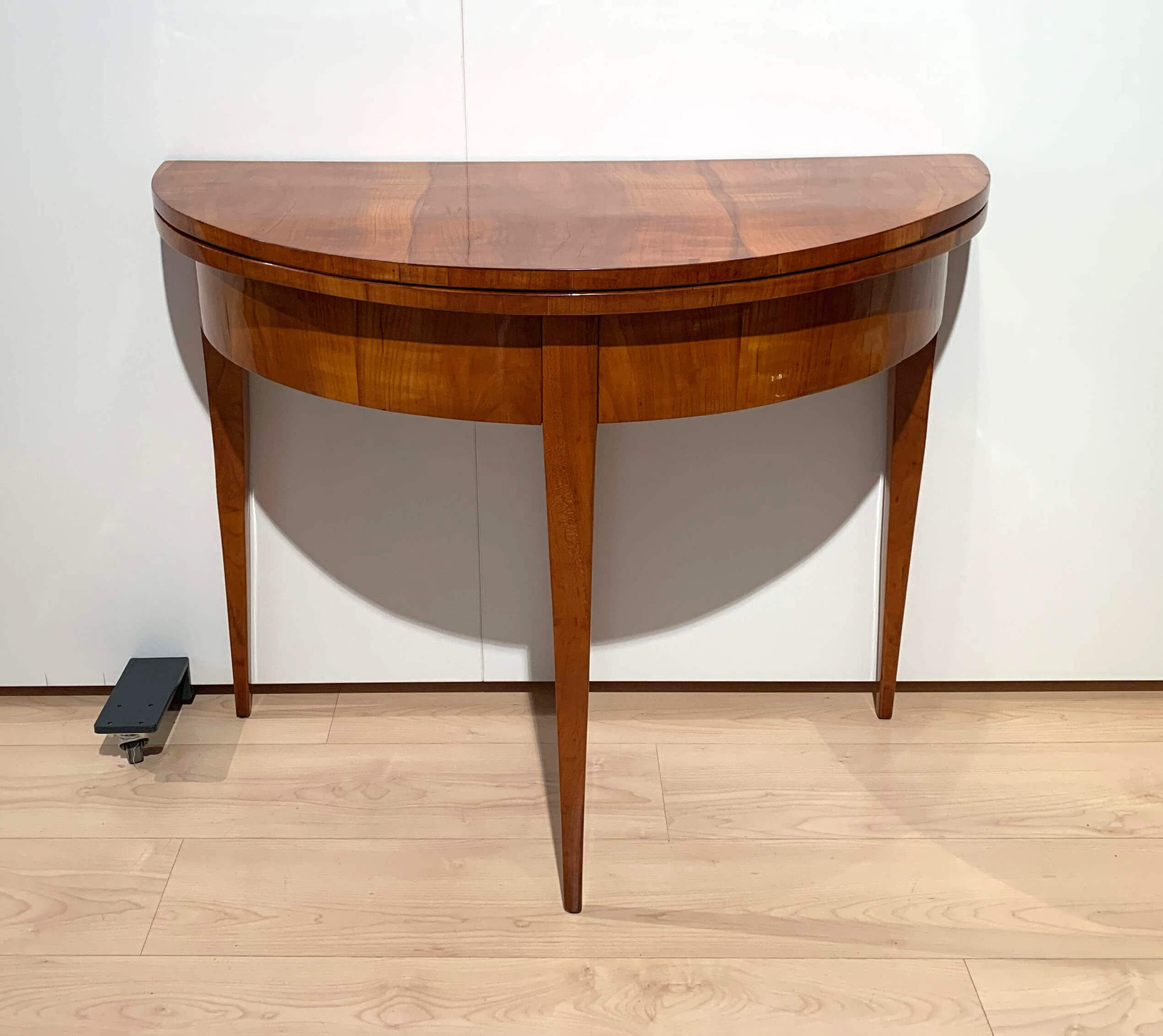 Biedermeier demi-lune fold-out table, cherry veneer, south germany, circa 1820