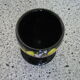 Black egg cup with hand-painted floral decoration