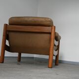 Teak and leather club armchairs