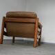 Teak and leather club armchairs