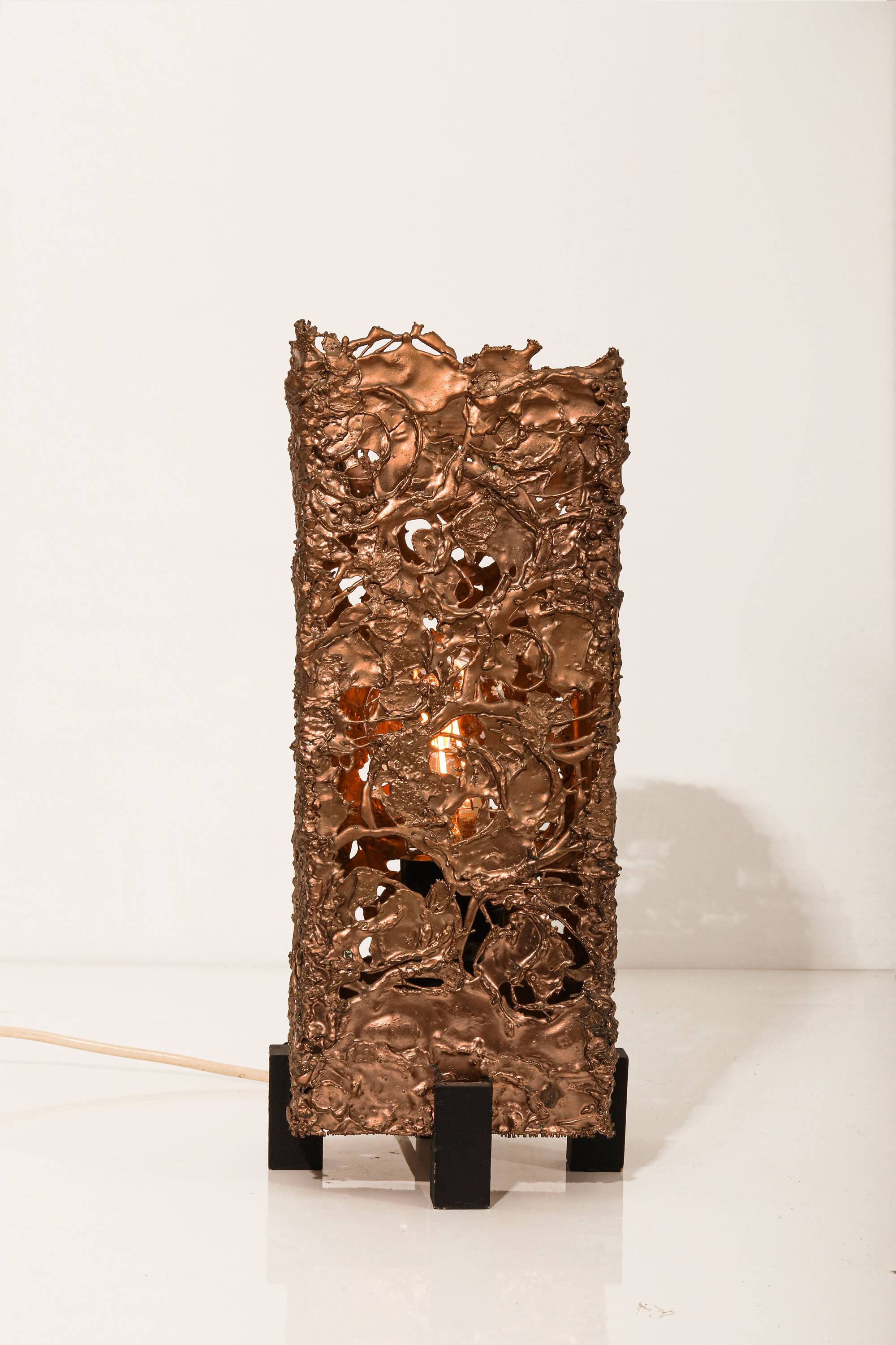 Set of 3 Finnish Aimo Tukiainen lamps in cast copper, 1960s."