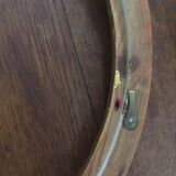 Round frames in gilded wood.