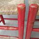 2 vintage red straw chairs