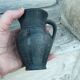 Pitcher in matte and glossy black pottery