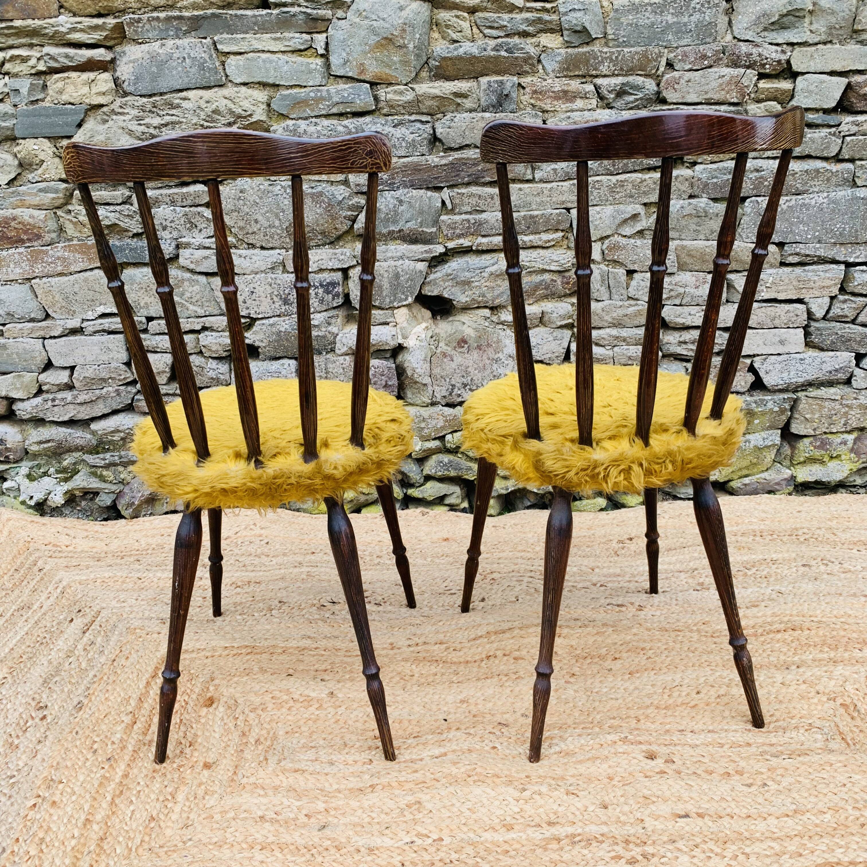 Pair of yellow moumoute chairs