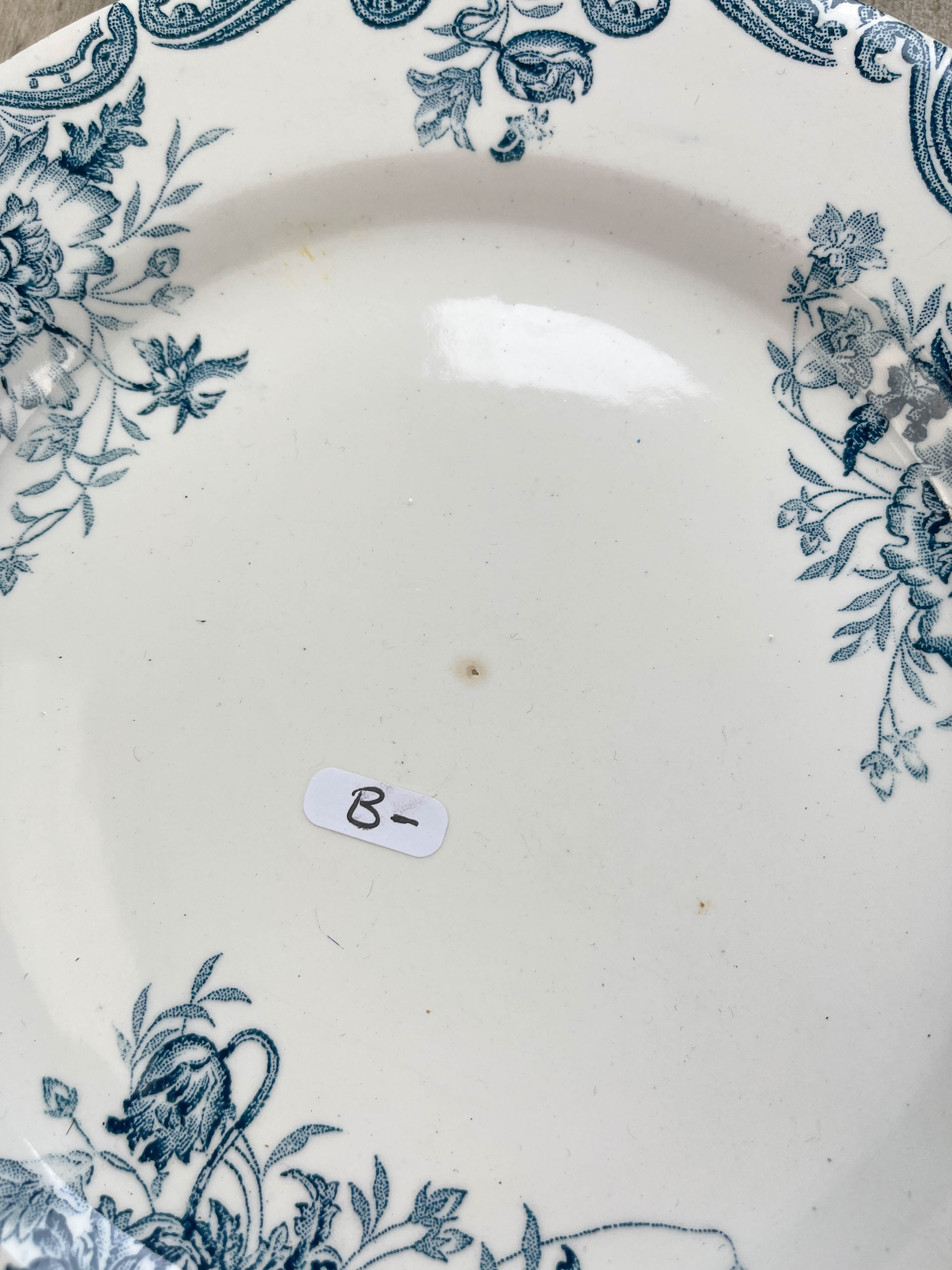 6 green and blue mismatched iron earth plates