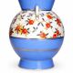 Art Deco round vase by Boch Frères Keramis, red flowers and blue bands.