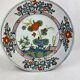 Delftware plate with gilded highlights, relief decoration, 18th century, 35 cm