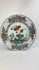 Plat en faïence de Delft à rehauts dorés, décor en relief, XVIIIe, 35 cm