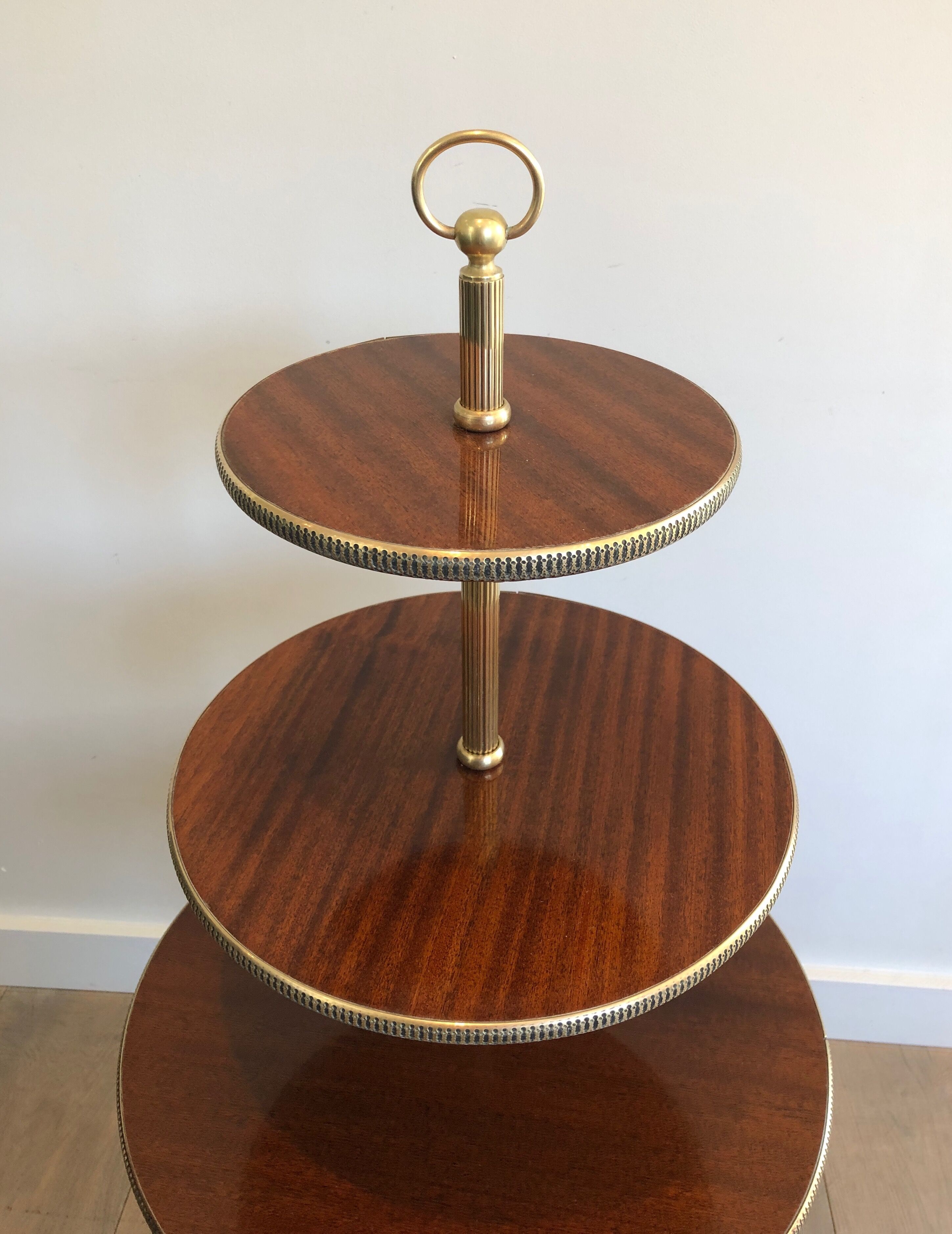 Round table of neoclassical style with triple plateaux 1940