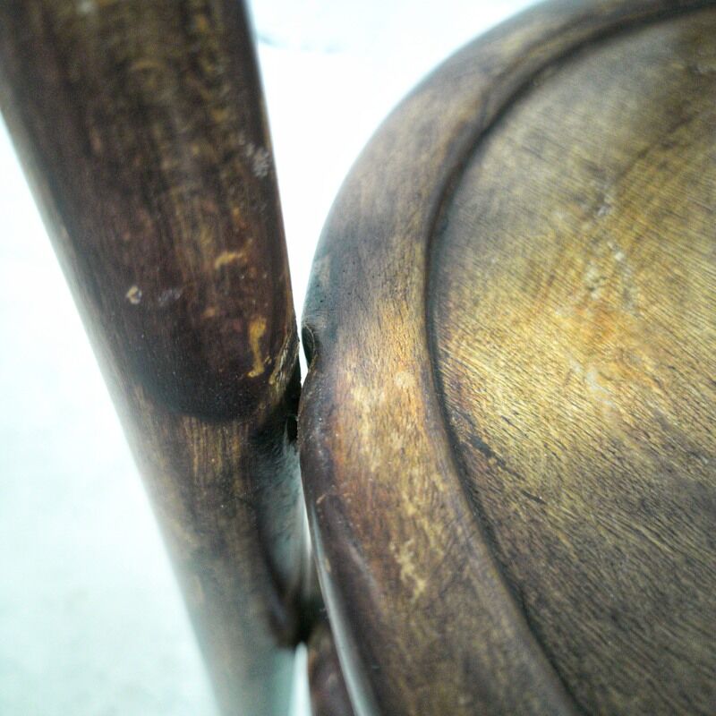 Antique children's chair in curved wood