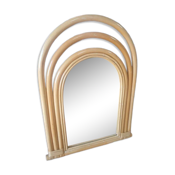 Beautiful rounded clear rattan mirror