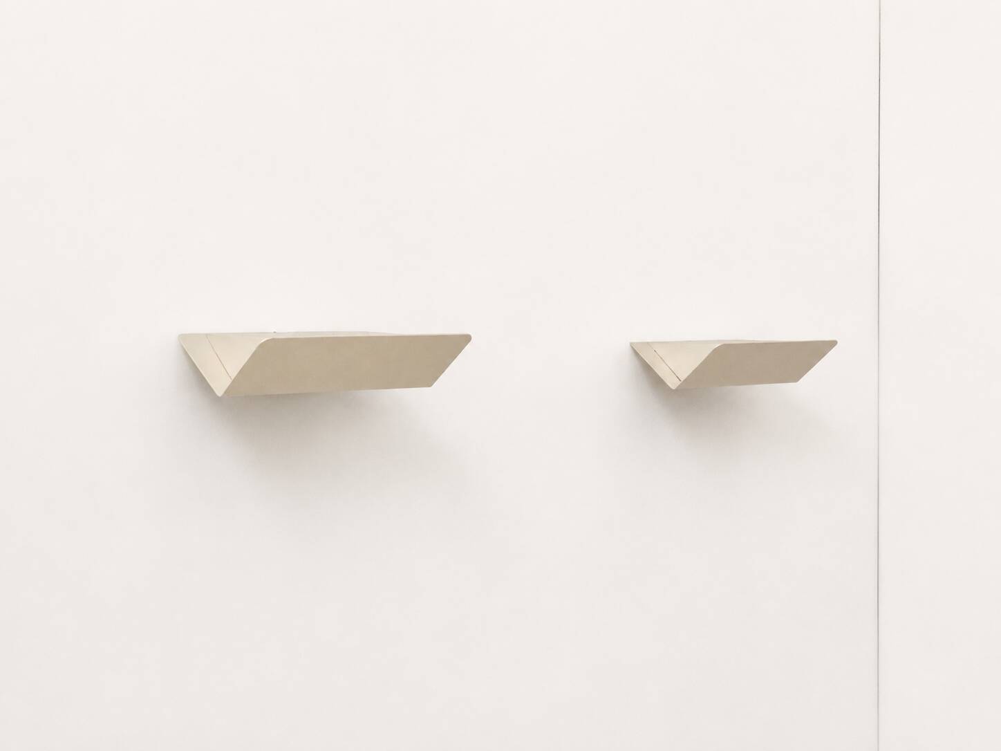 Pair of vintage wall sconces, matte white metal, France, 1970.
